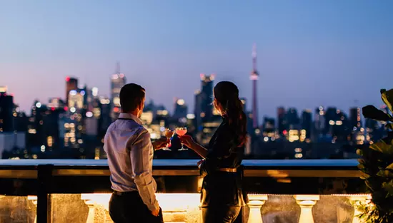 A couple enjoying the view on a patio